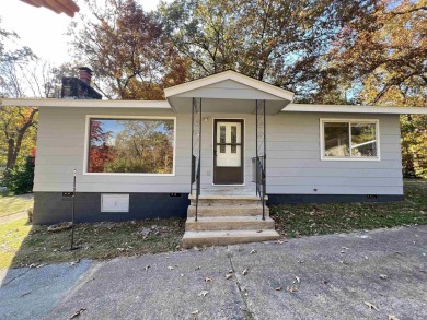 Charming and move-in ready, this beautifully updated 2-bedroom on Cherokee Village North Course in Arkansas - for sale on GolfHomes.com, golf home, golf lot