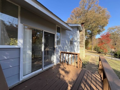 Charming and move-in ready, this beautifully updated 2-bedroom on Cherokee Village North Course in Arkansas - for sale on GolfHomes.com, golf home, golf lot