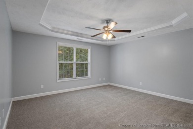 Welcome to 2996 Carolina Way, a spacious 4-bedroom, 3.5-bath on Carolina Lakes Country Club in North Carolina - for sale on GolfHomes.com, golf home, golf lot