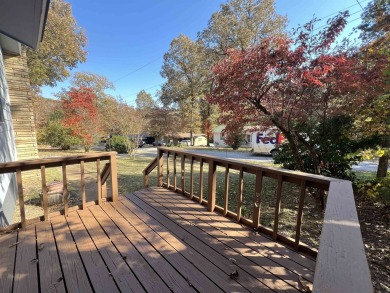 Charming and move-in ready, this beautifully updated 2-bedroom on Cherokee Village North Course in Arkansas - for sale on GolfHomes.com, golf home, golf lot