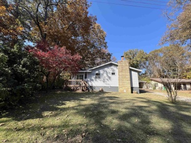 Charming and move-in ready, this beautifully updated 2-bedroom on Cherokee Village North Course in Arkansas - for sale on GolfHomes.com, golf home, golf lot