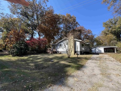 Charming and move-in ready, this beautifully updated 2-bedroom on Cherokee Village North Course in Arkansas - for sale on GolfHomes.com, golf home, golf lot