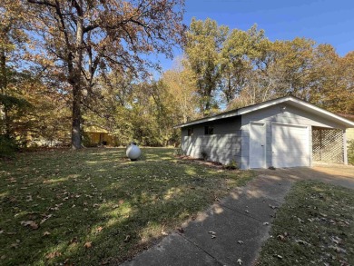 Charming and move-in ready, this beautifully updated 2-bedroom on Cherokee Village North Course in Arkansas - for sale on GolfHomes.com, golf home, golf lot