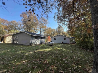 Charming and move-in ready, this beautifully updated 2-bedroom on Cherokee Village North Course in Arkansas - for sale on GolfHomes.com, golf home, golf lot