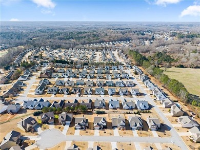 Golf cart life just hits different-and 4820 Anvil Court on Traditions of Braselton Golf Club in Georgia - for sale on GolfHomes.com, golf home, golf lot