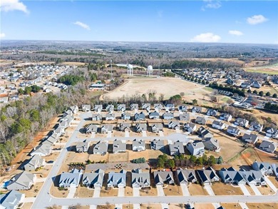 Golf cart life just hits different-and 4820 Anvil Court on Traditions of Braselton Golf Club in Georgia - for sale on GolfHomes.com, golf home, golf lot