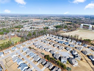 Golf cart life just hits different-and 4820 Anvil Court on Traditions of Braselton Golf Club in Georgia - for sale on GolfHomes.com, golf home, golf lot