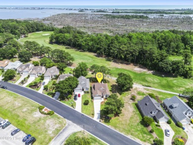Located on the 10th hole of the prestigious North Shore Golf on North Shore Country Club in North Carolina - for sale on GolfHomes.com, golf home, golf lot