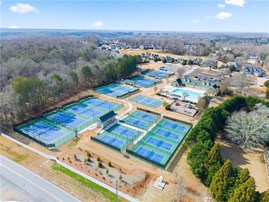 Golf cart life just hits different-and 4820 Anvil Court on Traditions of Braselton Golf Club in Georgia - for sale on GolfHomes.com, golf home, golf lot