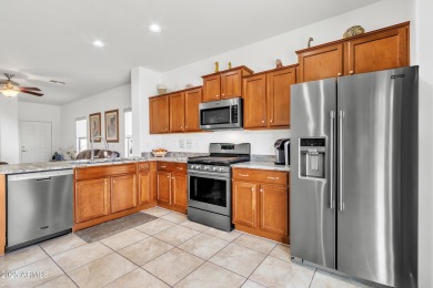 Step into style and comfort with this beautifully upgraded home on Poston Butte Golf Club in Arizona - for sale on GolfHomes.com, golf home, golf lot