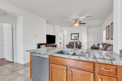 Step into style and comfort with this beautifully upgraded home on Poston Butte Golf Club in Arizona - for sale on GolfHomes.com, golf home, golf lot