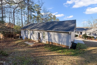 Welcome to this inviting gem in the gated Carolina Trace on Carolina Trace Country Club in North Carolina - for sale on GolfHomes.com, golf home, golf lot