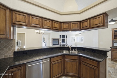 Entertainers Dream Backyard! Lagoon Style Pebble Tek Solar on London Bridge Golf Course in Arizona - for sale on GolfHomes.com, golf home, golf lot