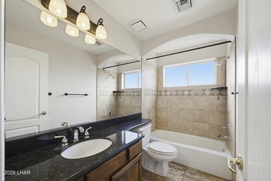 Entertainers Dream Backyard! Lagoon Style Pebble Tek Solar on London Bridge Golf Course in Arizona - for sale on GolfHomes.com, golf home, golf lot