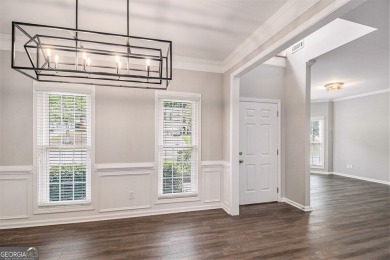Stunning stucco home in the highly sought-after Summer Grove on Summergrove Golf Club in Georgia - for sale on GolfHomes.com, golf home, golf lot