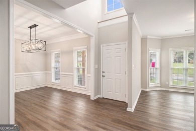 Stunning stucco home in the highly sought-after Summer Grove on Summergrove Golf Club in Georgia - for sale on GolfHomes.com, golf home, golf lot