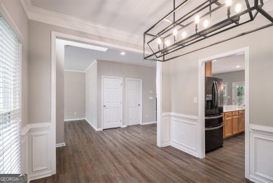 Stunning stucco home in the highly sought-after Summer Grove on Summergrove Golf Club in Georgia - for sale on GolfHomes.com, golf home, golf lot