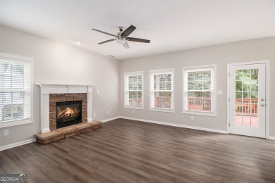 Stunning stucco home in the highly sought-after Summer Grove on Summergrove Golf Club in Georgia - for sale on GolfHomes.com, golf home, golf lot