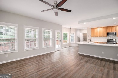 Stunning stucco home in the highly sought-after Summer Grove on Summergrove Golf Club in Georgia - for sale on GolfHomes.com, golf home, golf lot