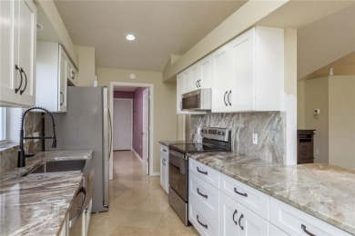 Welcome to this charming two-bedroom, two-bath home with a on Glen Lakes Country Club in Florida - for sale on GolfHomes.com, golf home, golf lot