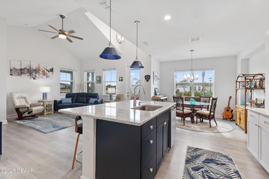 Perfectly located Dreamsicle cottage 2 bedroom/ 2 bath with den on LPGA International Golf Course in Florida - for sale on GolfHomes.com, golf home, golf lot