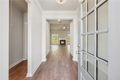 Popular and hard to find Ranch style home on a private homesite on Traditions of Braselton Golf Club in Georgia - for sale on GolfHomes.com, golf home, golf lot