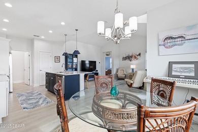 Perfectly located Dreamsicle cottage 2 bedroom/ 2 bath with den on LPGA International Golf Course in Florida - for sale on GolfHomes.com, golf home, golf lot