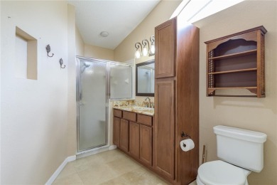 Welcome to this charming two-bedroom, two-bath home with a on Glen Lakes Country Club in Florida - for sale on GolfHomes.com, golf home, golf lot