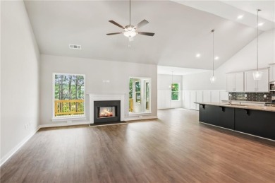 Popular and hard to find Ranch style home on a private homesite on Traditions of Braselton Golf Club in Georgia - for sale on GolfHomes.com, golf home, golf lot