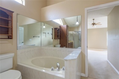 Welcome to this charming two-bedroom, two-bath home with a on Glen Lakes Country Club in Florida - for sale on GolfHomes.com, golf home, golf lot