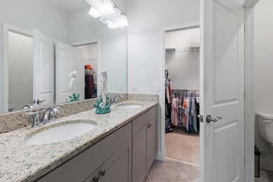 Perfectly located Dreamsicle cottage 2 bedroom/ 2 bath with den on LPGA International Golf Course in Florida - for sale on GolfHomes.com, golf home, golf lot