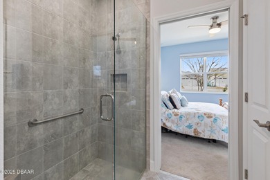 Perfectly located Dreamsicle cottage 2 bedroom/ 2 bath with den on LPGA International Golf Course in Florida - for sale on GolfHomes.com, golf home, golf lot