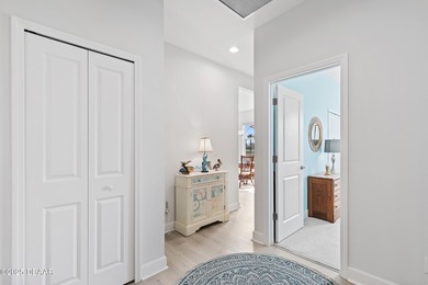 Perfectly located Dreamsicle cottage 2 bedroom/ 2 bath with den on LPGA International Golf Course in Florida - for sale on GolfHomes.com, golf home, golf lot