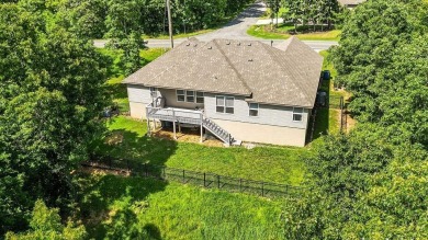 Built in 2022, this beautifully designed 3-bedroom, 2-bath home on Bella Vista Country Club - Highlands in Arkansas - for sale on GolfHomes.com, golf home, golf lot