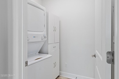 Perfectly located Dreamsicle cottage 2 bedroom/ 2 bath with den on LPGA International Golf Course in Florida - for sale on GolfHomes.com, golf home, golf lot