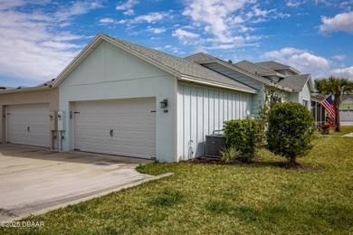 Perfectly located Dreamsicle cottage 2 bedroom/ 2 bath with den on LPGA International Golf Course in Florida - for sale on GolfHomes.com, golf home, golf lot