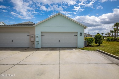 Perfectly located Dreamsicle cottage 2 bedroom/ 2 bath with den on LPGA International Golf Course in Florida - for sale on GolfHomes.com, golf home, golf lot