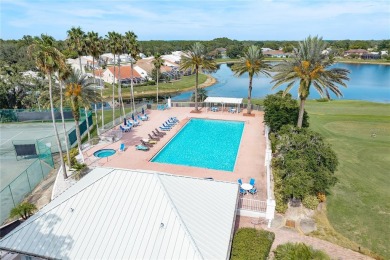 Welcome to this charming two-bedroom, two-bath home with a on Glen Lakes Country Club in Florida - for sale on GolfHomes.com, golf home, golf lot