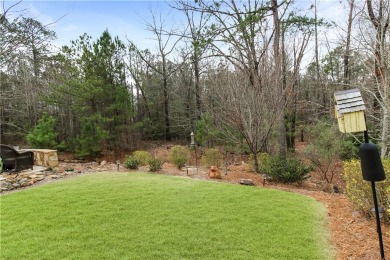 Welcome to your dream home, where elegance meets practicality in on Grand National Golf Course in Alabama - for sale on GolfHomes.com, golf home, golf lot