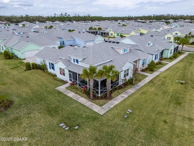 Perfectly located Dreamsicle cottage 2 bedroom/ 2 bath with den on LPGA International Golf Course in Florida - for sale on GolfHomes.com, golf home, golf lot