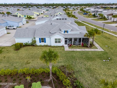 Perfectly located Dreamsicle cottage 2 bedroom/ 2 bath with den on LPGA International Golf Course in Florida - for sale on GolfHomes.com, golf home, golf lot