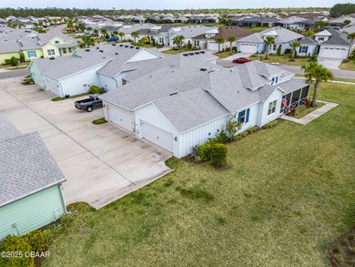 Perfectly located Dreamsicle cottage 2 bedroom/ 2 bath with den on LPGA International Golf Course in Florida - for sale on GolfHomes.com, golf home, golf lot
