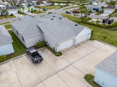 Perfectly located Dreamsicle cottage 2 bedroom/ 2 bath with den on LPGA International Golf Course in Florida - for sale on GolfHomes.com, golf home, golf lot