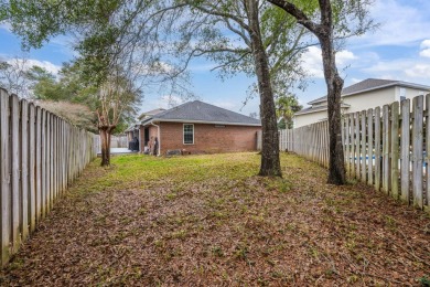 This well-maintained 4-bedroom, 2-bathroom home is located just on Fort Walton Beach Golf Course in Florida - for sale on GolfHomes.com, golf home, golf lot