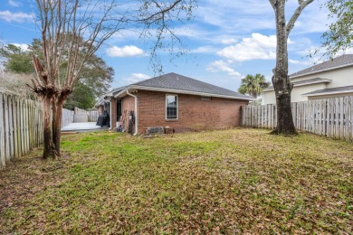 This well-maintained 4-bedroom, 2-bathroom home is located just on Fort Walton Beach Golf Course in Florida - for sale on GolfHomes.com, golf home, golf lot