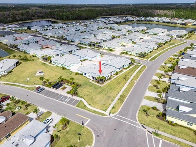 Perfectly located Dreamsicle cottage 2 bedroom/ 2 bath with den on LPGA International Golf Course in Florida - for sale on GolfHomes.com, golf home, golf lot