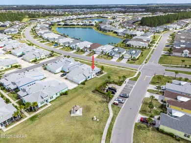 Perfectly located Dreamsicle cottage 2 bedroom/ 2 bath with den on LPGA International Golf Course in Florida - for sale on GolfHomes.com, golf home, golf lot