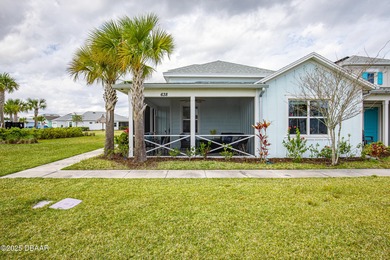 Perfectly located Dreamsicle cottage 2 bedroom/ 2 bath with den on LPGA International Golf Course in Florida - for sale on GolfHomes.com, golf home, golf lot