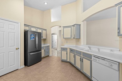 This home is perfectly positioned overlooking the 1st hole of on Highlands Reserve Golf Club in Florida - for sale on GolfHomes.com, golf home, golf lot