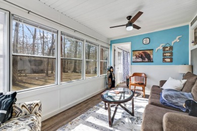 This lovely home on a one and a half lot provides ample privacy on Lake Tansi Village Country Club in Tennessee - for sale on GolfHomes.com, golf home, golf lot